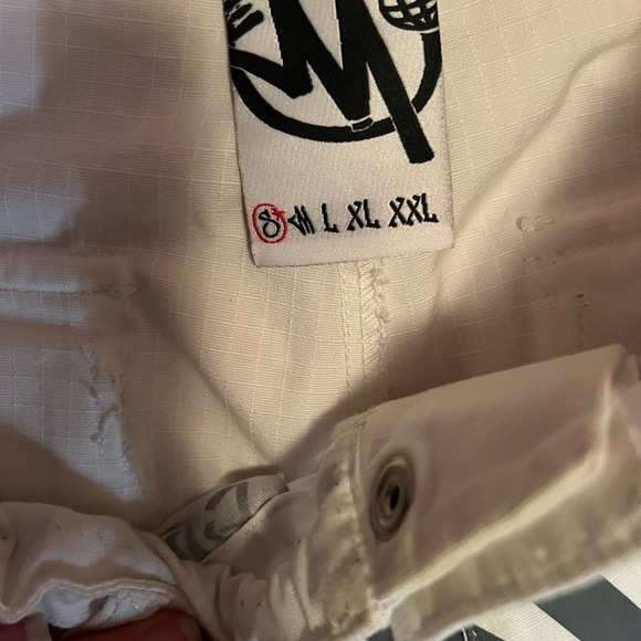 Pantalon minus Two vrai acheté sur le site à 250 il y a un an. taille Small - Picture 7 of 8